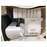 (Q) Imagine sewing machine with carrying bag