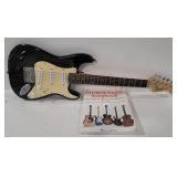 (Y)  Squier mini Guitar, by Fender