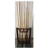 (AN) 6 pool cues, 2 shorties, and rack