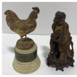 (AN) rooster award, and carved wooden statue