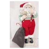 Aminated Santa decorative display. 23" tall. Has