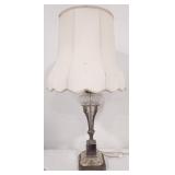 Metal and cut-glass lamp base with ornate face