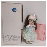Porcelain doll from Design Debut. Doll is