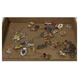 (AF) Flat of various costume jewelry, brooches,