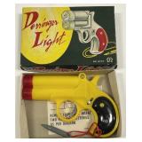 Vintage Derringer Pistol Light In Box
Made in