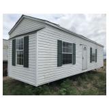 Mobile home on transporting frame