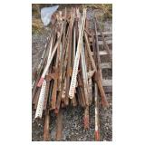 Assorted metal fence posts