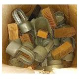 Box of wooden blocks and metal fence post caps