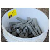 5 gallon bucket filled with 5.5" bolts