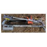 3 Rust-Oleum marking Wands and a caulk gun