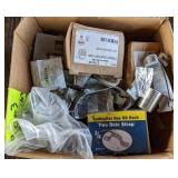 Box of various fasteners incl. Two hole straps,