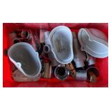 Various metal fittings and covers