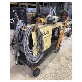 Hobart Titan 8000 has welder with lead and cart,