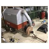 Trac vac gas leaf vac trailer, hose inside