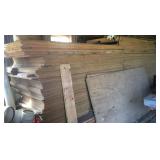 Large lot of particle board, insulation, lumber