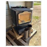 Herman wood stove, top load, (3) 6' stove pipe, bldg: green