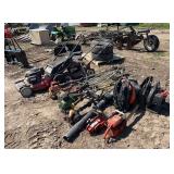 Lot of push mowers, weed eaters, chainsaws, & leaf blowers, row:6