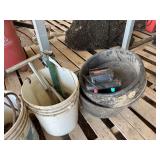Bucket of fence charger, feeding pails, & misc. bldg:green