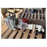 Johnson 25 hp 2 stroke boat motor & 6 gallon gas tank, bldg:green