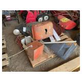 Pallet of tractor part- mostly IH, bldg:green
