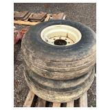 (2) 14L-16.1 mounted tires 8 hole rims