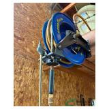 Air hose and reel buyer must remove