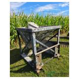 Skid steer mount concrete bin