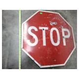 Stop sign (bullet holes)