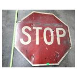 Stop sign (bullet holes)