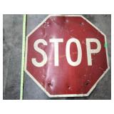 Stop sign (bullet holes)