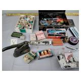 Keys, hockey puck, pens, pencils, playing cards,