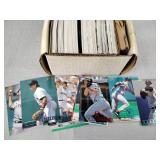 Baseball trading cards including check Mikal Roy,