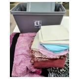 (2)  30 gallon storage totes, blankets, pillow