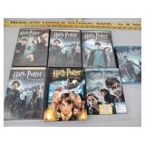 Harry Potter movie DVDs, including a couple