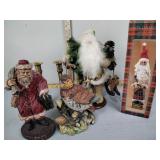 Christmas figurines including Santas, bird