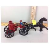 Cast iron fire wagon with driver and horse