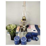Oil lamp, vase, linens, small quilt wall hanger,