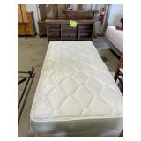 Twin bed complete with headboard and rails,
