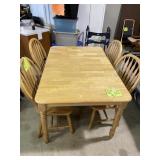 Blonde dining set with four chairs, has wear