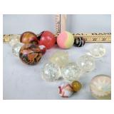 Marble shooters and other rubber balls