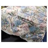 Machine made quilt, plastic storage tote, seat