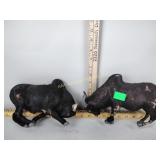 Cow hide bull figurines