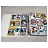 Album of assorted baseball and basketball cards