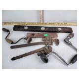 Drills, pipe wrenches, levelers