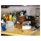 Blender, cleaning supplies telephone,
