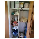 Projector screen, hanging light, toaster, afghan,