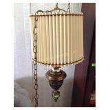 Hanging brass light fixture