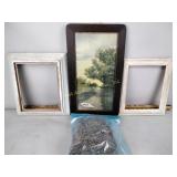 2 white frames, print of lady on road