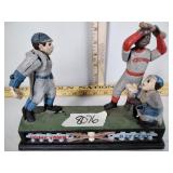 Cast iron baseball pitcher and batter unsure if