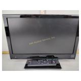 Dynex flat screen TV with remote - powers on, Sun